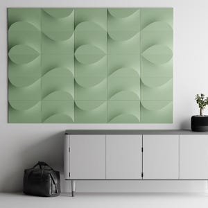 May include: A wall-mounted installation of sage green square panels featuring a repeating three-dimensional wave and petal pattern. The panels create a textured surface with soft shadows, arranged in a grid to form a large, cohesive geometric design.