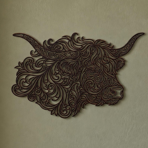 Close-up of Highland Cow Profile filigree wall art in Mistletoe Green in a contrasting room