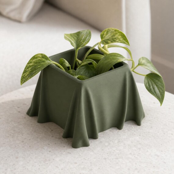 Rear three-quarter close-up of a Dark Green VeilCove planter with trailing pothos