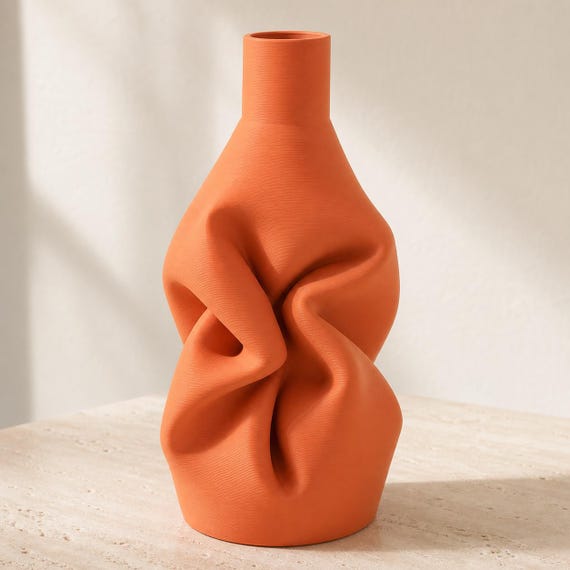 Terracotta DrapeForm Gathered Fold sculptural vase in a close three-quarter view