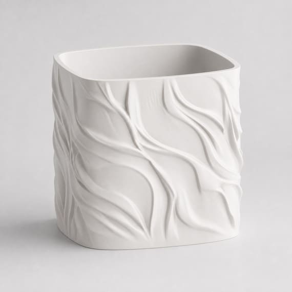 Elevated view of an empty White BreezeFold planter showing its rounded rectangular opening