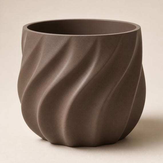 Empty Cocoa Brown CurrentFold planter showing the broad flowing rib texture