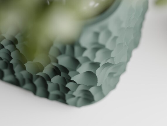 Close-up inside the StoneCell planter showing its open top and cellular rim texture