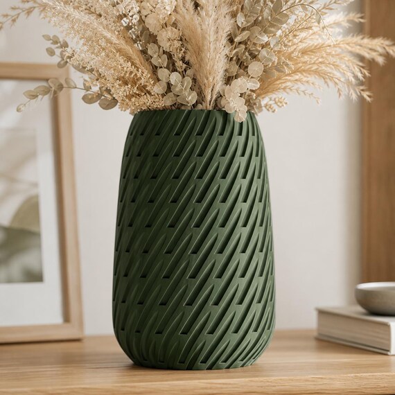 Close-up of the Dark Green Leafstream vase showing its flowing leaf-inspired texture