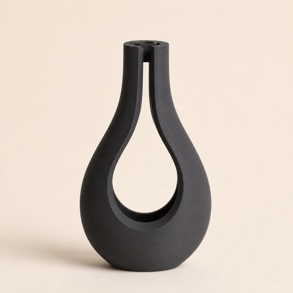 Close-up of the empty AerialArc vase holder in Charcoal showing the circular 15 mm tube cradle