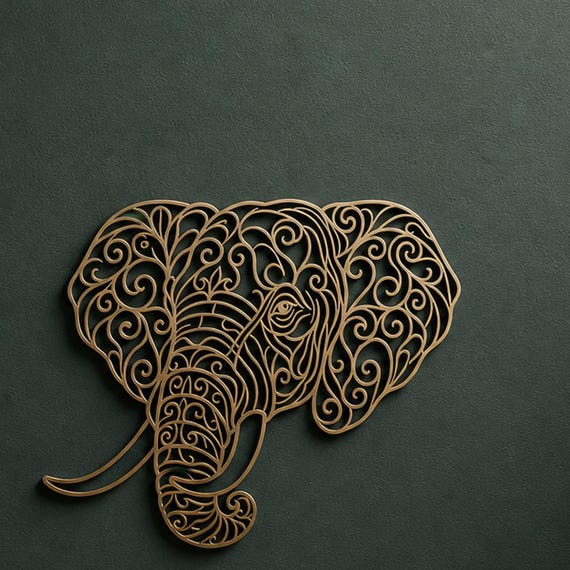 Close-up of Elephant Head filigree wall art in Bronze in a contrasting room