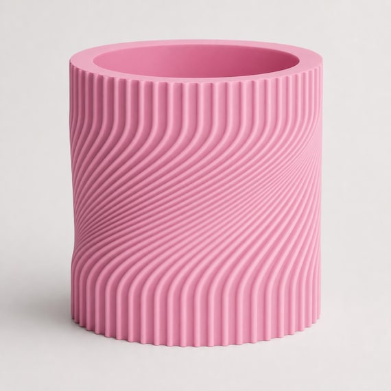 Rear three-quarter close-up of an empty Sakura Pink Swayline wave rib planter