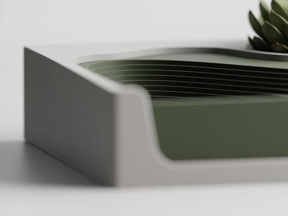 Left-side close-up of the TerraceHub organizer's layered landscape surface and ivory frame