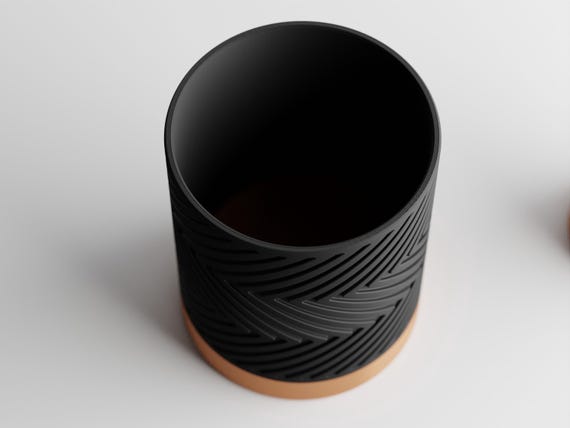 Elevated close-up of an empty Copper Noir GleamRidge planter showing its circular opening