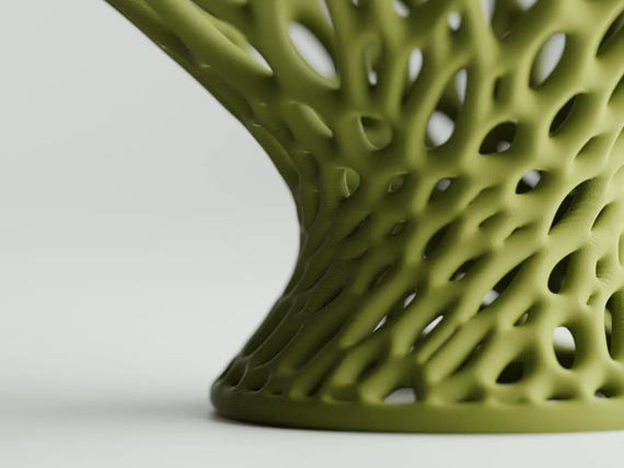 Close-up of the LatticeFlare pedestal bowl's flowing hourglass base