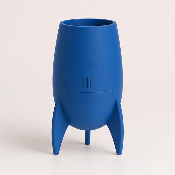 Close-up angled view of the Orbitcrest capsule planter in Marine Blue