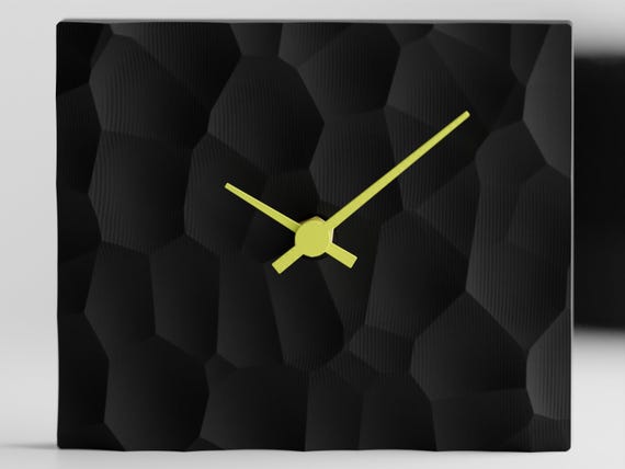 Straight-on close-up of the Facetfield Night Citrus tabletop clock