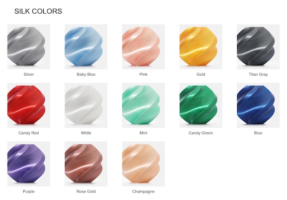 Silk color guide showing thirteen labeled lustrous color samples on a white background.
