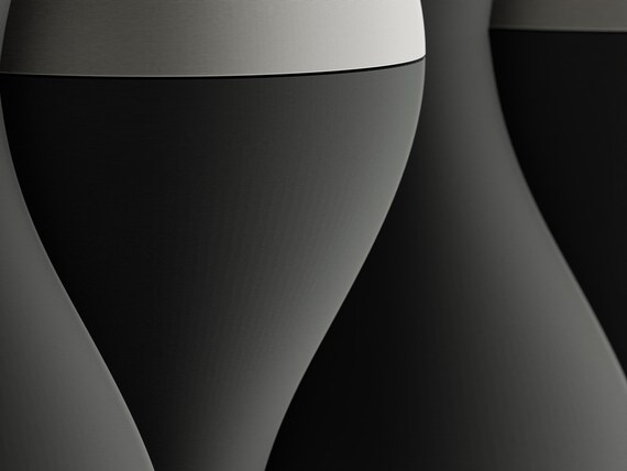 Macro close-up of the charcoal and ivory HaloWeave rounded relief surface