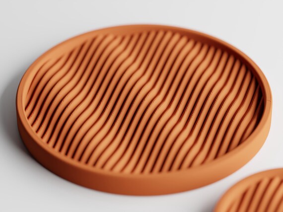 Close-up of the large Ripple Haven jewelry tray and its diagonal wave channels