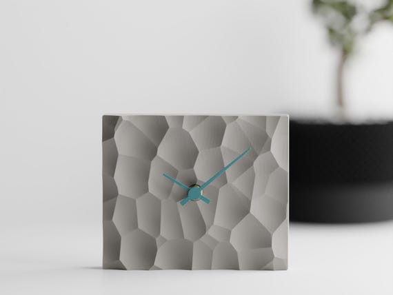 Glacier Current Facetfield clock shown fully assembled in a realistic shelf setting