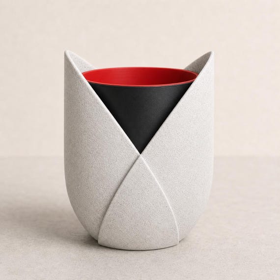 Close-up of the CrescentWrap planter in Marble White, Black, and Red