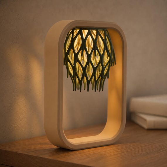Cord-free Latticefall lamp with Desert Tan frame and Dark Green flameless-tealight shade