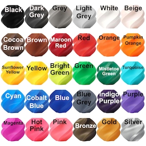 May include: A color chart featuring 30 spiral-shaped objects in various colors, including black, grey, red, orange, yellow, green, blue, purple, pink, and metallic tones. Each object has a color name label.