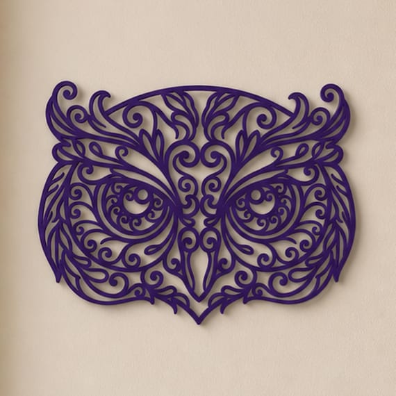 Close-up of Owl filigree wall art in Bronze in a contrasting room