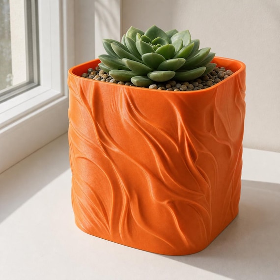 Pumpkin Orange BreezeFold indoor planter with a compact rosette succulent