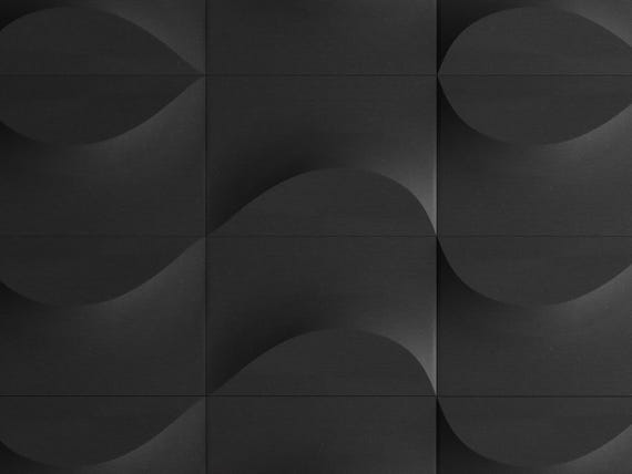 Front close-up of a charcoal TideFold tile arrangement with alternating relief directions