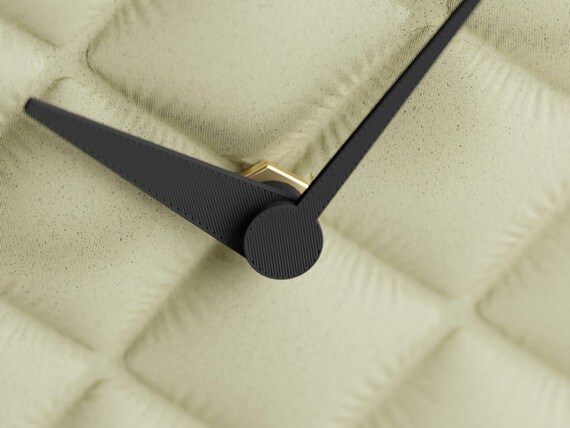 Close-up of the Quiltmere clock's softly gathered diamond-quilt texture
