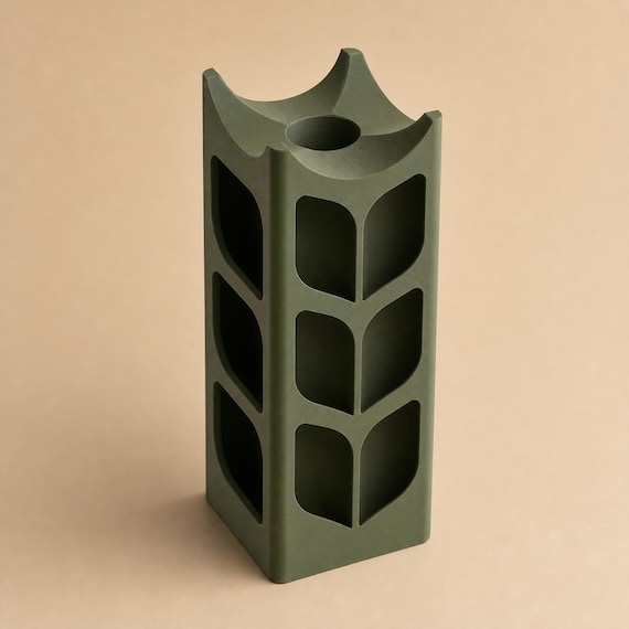 Close-up angled view of the empty ArborLume architectural vase in Dark Green