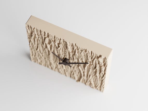 Angled close-up of the Barkhaven Birch Shadow clock profile and bark relief