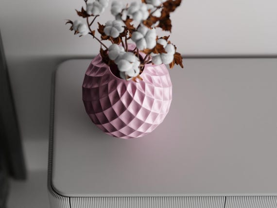 High-angle close-up of the Pink GemLattice vase, centered opening, and raised facets