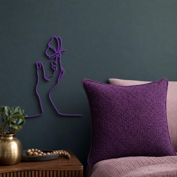 Butterfly Hand wall art in Purple in a contrasting showcase room
