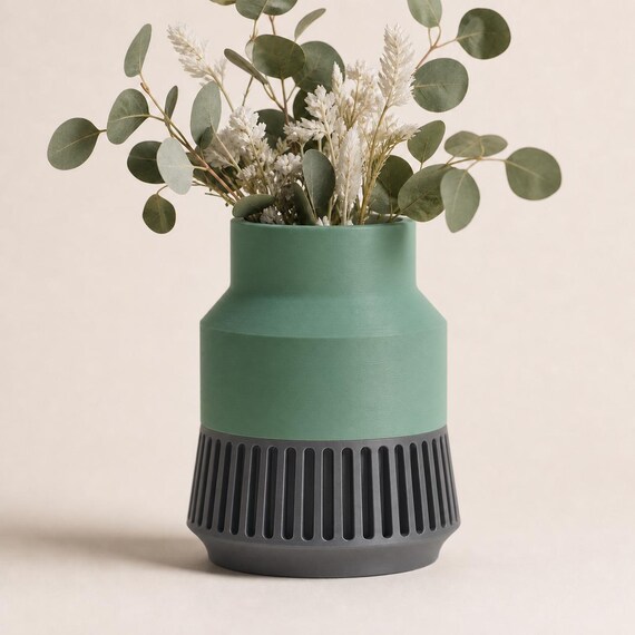 Close-up of the Tall StrataRise sculptural vase in Mistletoe Green and Dark Grey