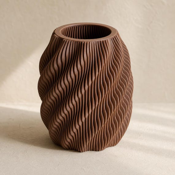 Quietflow textured vase in Cocoa Brown showing the circular opening and wave fins