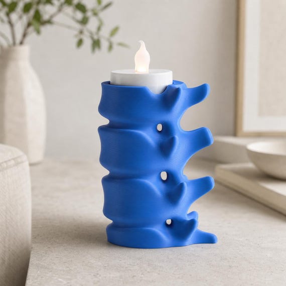 Cobalt Blue tall SpineGlow anatomical LED tealight holder in a neutral modern interior