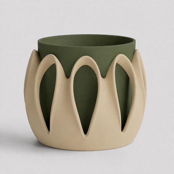 Arcloom planter in Woodland with Desert Tan outer arches and a Dark Green inner pot, viewed from a raised three-quarter angle on pale gray.