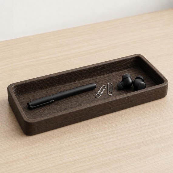 Timberfold long desk organizer holding a pen paper clips and earbuds