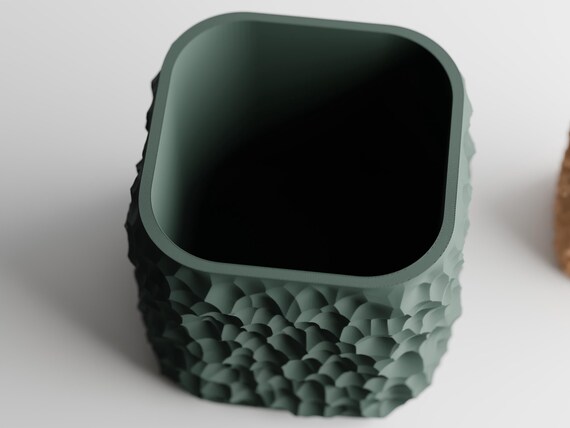 Elevated close-up of the StoneCell planter opening and textured exterior walls