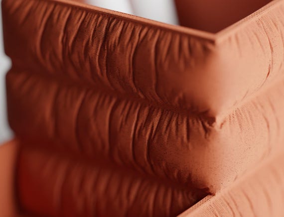 Detail close-up of the GatherFold tall pen cup and softly gathered surface