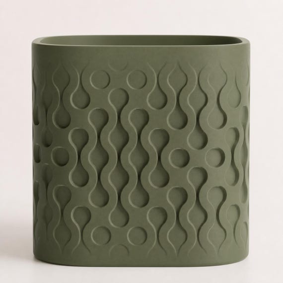 Close-up front view of the Tidecell droplet wave relief in Dark Green