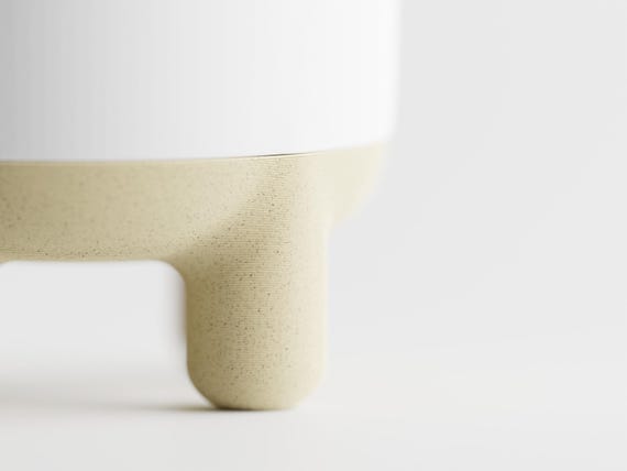 Detail close-up of the CalmRise Desert Tan lower accent and softly rounded foot