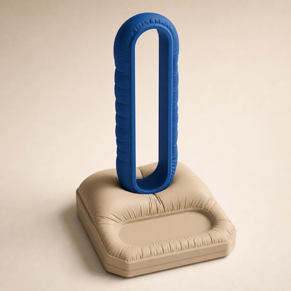 Close-up elevated view of the CushionLoop Organizer Base stand in Marine Blue and Desert Tan