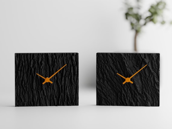 Riven Bark and Vertical Bark clock styles shown side by side in Ember Bark colors