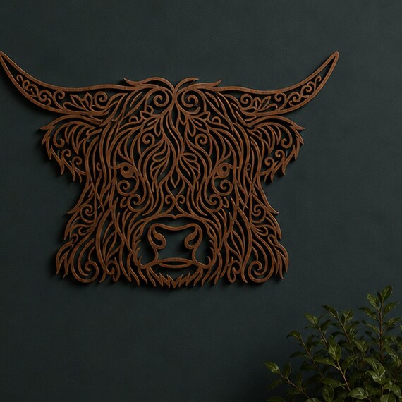 Close-up of Ornate Highland Cow filigree wall art in Cocoa Brown in a contrasting room