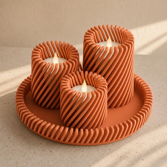 Terracotta Spiral Serenade openwork candle holder trio and matching round tray