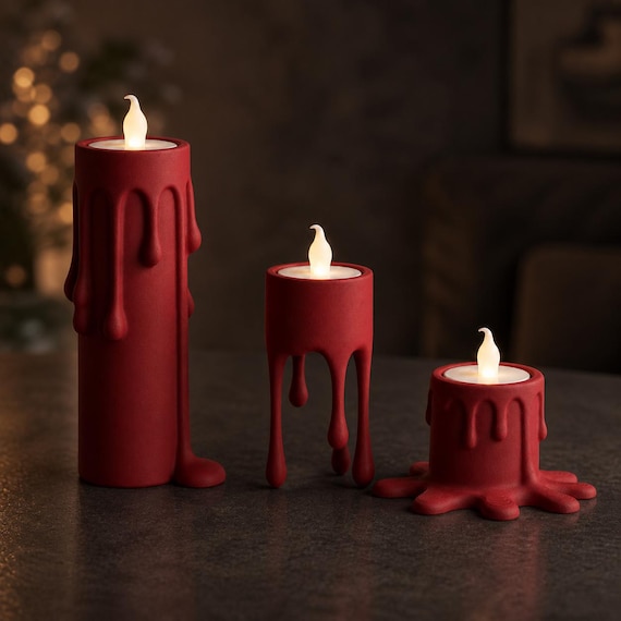 Dark Red MeltMuse sculptural LED tealight trio in an elegant evening setting