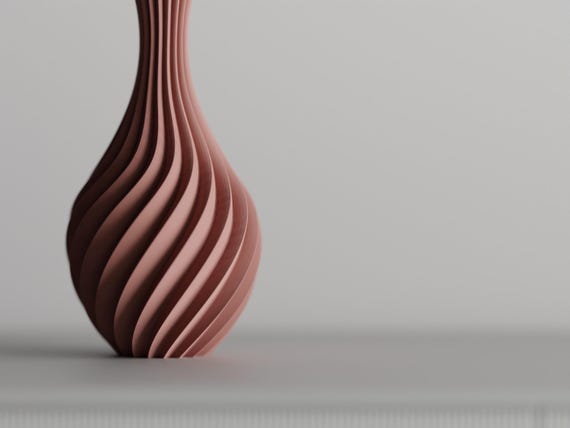 Detail close-up of the SwaySpire vase sweeping spiral relief