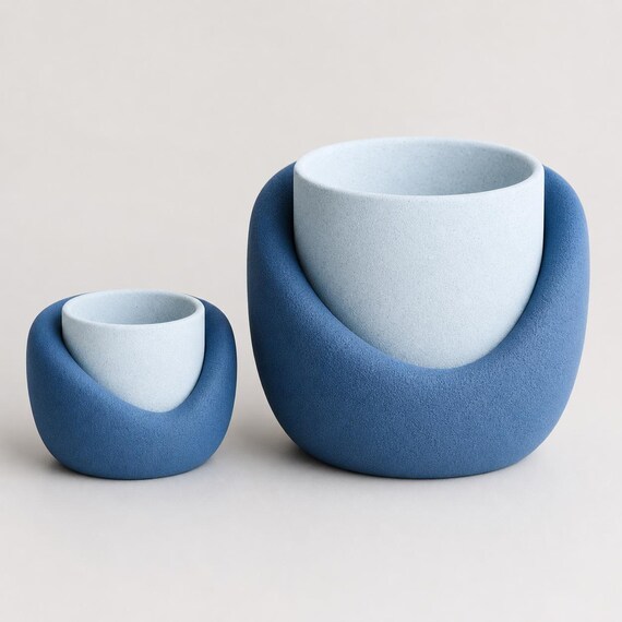 Close-up comparison of the proportional four-inch and eight-inch NestArc Halo planters