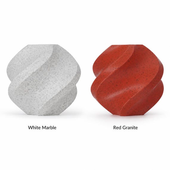 White marble and red granite color reference showing the two stone-pattern finish options for the elephant accent lamp.