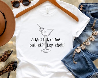 A Tini Bit Older, But Still Top Shelf Birthday Shirt,50th Birthday Shirt, Milestone Birthday Gift for Her, Senior Citizen Birthday Tee