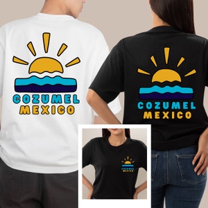 May include: Two white and black t-shirts with a graphic of a yellow sun setting over blue water. The text "COZUMEL MEXICO" is printed below the graphic.